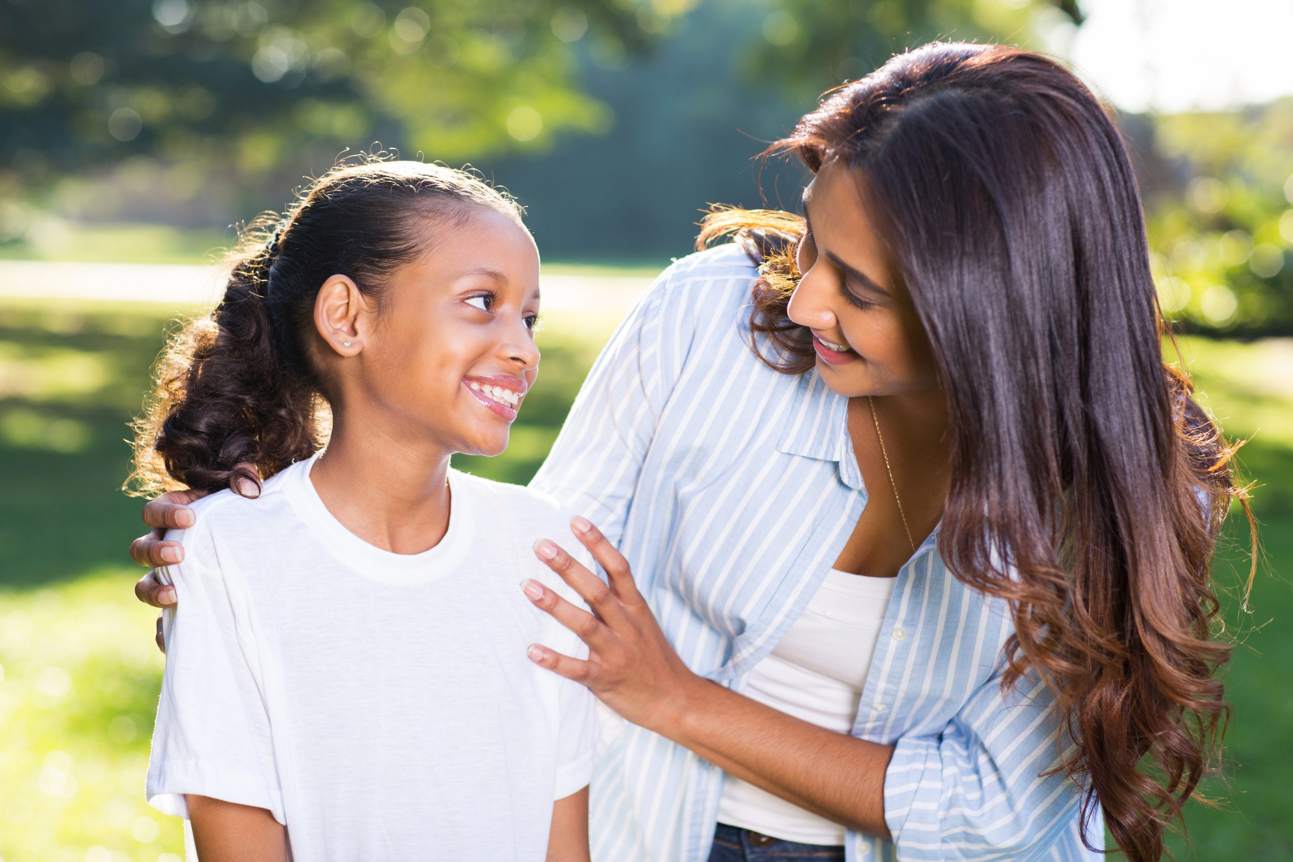 daughter hugging mother